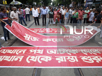 Citizens participate in ''Claim the Way'' during a protest rally against the rape and murder of a PGT woman doctor at Government-run R G Kar...