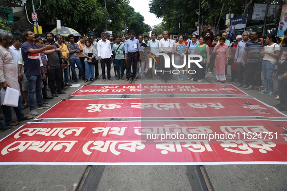 Citizens participate in ''Claim the Way'' during a protest rally against the rape and murder of a PGT woman doctor at Government-run R G Kar...