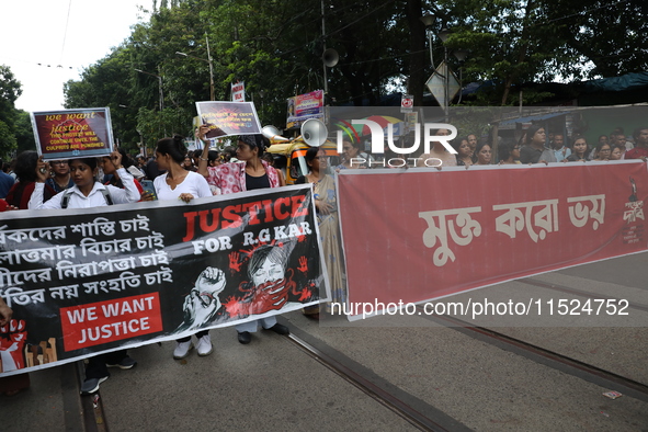 Citizens participate in ''Claim the Way'' during a protest rally against the rape and murder of a PGT woman doctor at Government-run R G Kar...