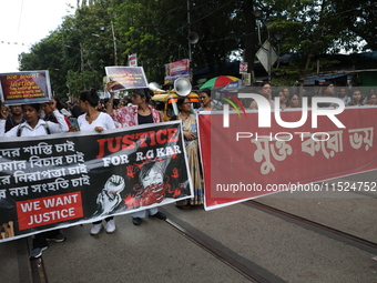 Citizens participate in ''Claim the Way'' during a protest rally against the rape and murder of a PGT woman doctor at Government-run R G Kar...