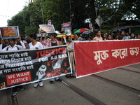 Citizens participate in ''Claim the Way'' during a protest rally against the rape and murder of a PGT woman doctor at Government-run R G Kar...