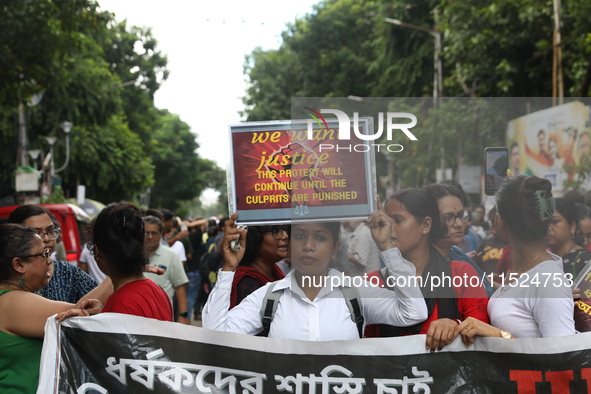 Citizens participate in ''Claim the Way'' during a protest rally against the rape and murder of a PGT woman doctor at Government-run R G Kar...