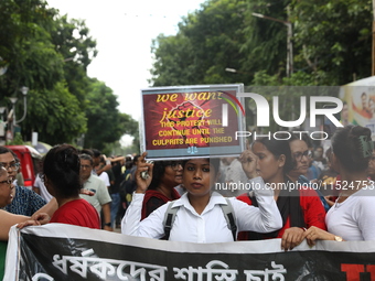 Citizens participate in ''Claim the Way'' during a protest rally against the rape and murder of a PGT woman doctor at Government-run R G Kar...