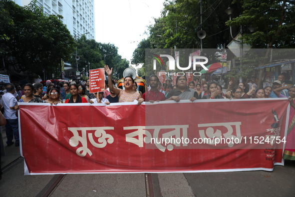 Citizens participate in ''Claim the Way'' during a protest rally against the rape and murder of a PGT woman doctor at Government-run R G Kar...