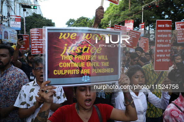 Citizens participate in ''Claim the Way'' during a protest rally against the rape and murder of a PGT woman doctor at Government-run R G Kar...