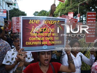 Citizens participate in ''Claim the Way'' during a protest rally against the rape and murder of a PGT woman doctor at Government-run R G Kar...