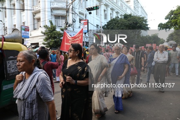 Citizens participate in ''Claim the Way'' during a protest rally against the rape and murder of a PGT woman doctor at Government-run R G Kar...