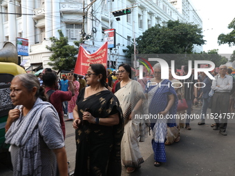 Citizens participate in ''Claim the Way'' during a protest rally against the rape and murder of a PGT woman doctor at Government-run R G Kar...