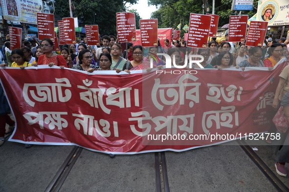 Citizens participate in ''Claim the Way'' during a protest rally against the rape and murder of a PGT woman doctor at Government-run R G Kar...