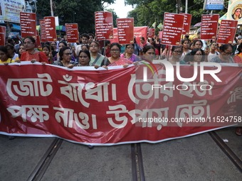 Citizens participate in ''Claim the Way'' during a protest rally against the rape and murder of a PGT woman doctor at Government-run R G Kar...