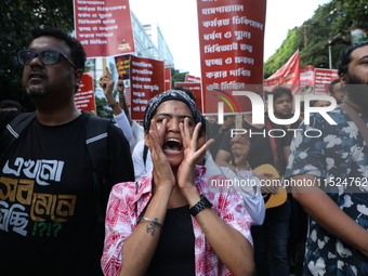 Citizens participate in ''Claim the Way'' during a protest rally against the rape and murder of a PGT woman doctor at Government-run R G Kar...