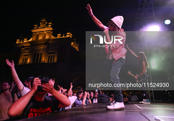 KRAKOW, POLAND - AUGUST 28:
The evangelistic band No Longer Music (NLM), performing at Krakow's UNESCO Market Square, on August 28, 2024, in...