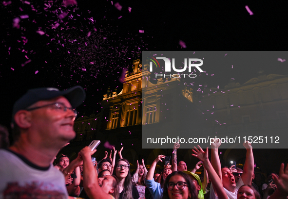 KRAKOW, POLAND - AUGUST 28:
Local Audience at Steiger International and No Longer Music's Evangelistic Performance in Krakow's UNESCO Market...