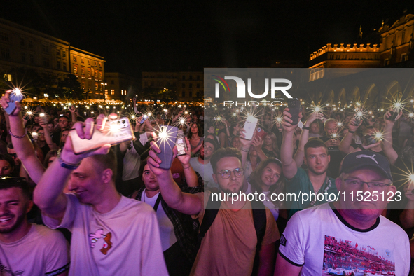 KRAKOW, POLAND - AUGUST 28:
Local Audience at Steiger International and No Longer Music's Evangelistic Performance in Krakow's UNESCO Market...