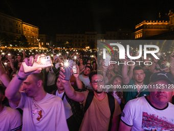 KRAKOW, POLAND - AUGUST 28:
Local Audience at Steiger International and No Longer Music's Evangelistic Performance in Krakow's UNESCO Market...