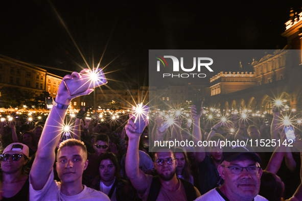 KRAKOW, POLAND - AUGUST 28:
Local Audience at Steiger International and No Longer Music's Evangelistic Performance in Krakow's UNESCO Market...