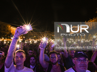 KRAKOW, POLAND - AUGUST 28:
Local Audience at Steiger International and No Longer Music's Evangelistic Performance in Krakow's UNESCO Market...