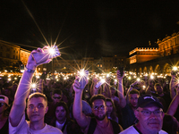 KRAKOW, POLAND - AUGUST 28:
Local Audience at Steiger International and No Longer Music's Evangelistic Performance in Krakow's UNESCO Market...