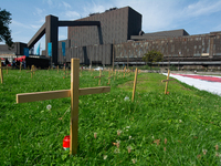 Crosses are placed in front of the headquarters of Thyssenkrupp industrial area in Duisburg, Germany, on August 29, 2024, as the IG Metall u...