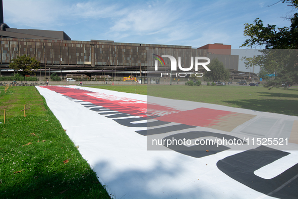 A large banner of ''Red Line'' is placed in front of the headquarters of Thyssenkrupp industrial area in Duisburg, Germany, on August 29, 20...