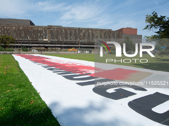 A large banner of ''Red Line'' is placed in front of the headquarters of Thyssenkrupp industrial area in Duisburg, Germany, on August 29, 20...