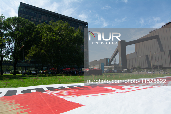 A large banner of ''Red Line'' is placed in front of the headquarters of Thyssenkrupp industrial area in Duisburg, Germany, on August 29, 20...