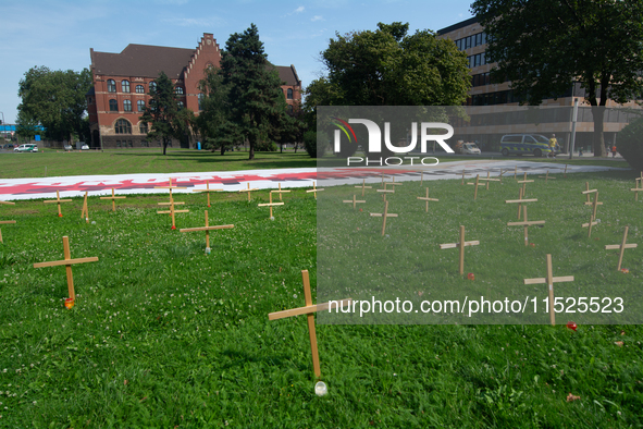 Crosses are placed in front of the headquarters of Thyssenkrupp industrial area in Duisburg, Germany, on August 29, 2024, as the IG Metall u...