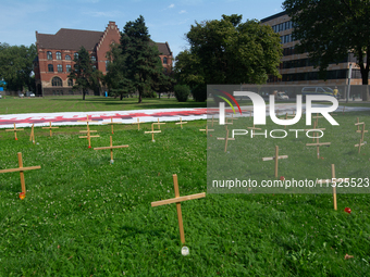 Crosses are placed in front of the headquarters of Thyssenkrupp industrial area in Duisburg, Germany, on August 29, 2024, as the IG Metall u...