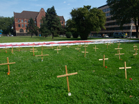 Crosses are placed in front of the headquarters of Thyssenkrupp industrial area in Duisburg, Germany, on August 29, 2024, as the IG Metall u...