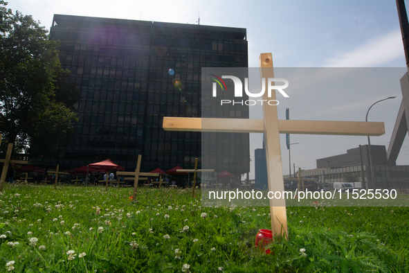 Crosses are placed in front of the headquarters of Thyssenkrupp industrial area in Duisburg, Germany, on August 29, 2024, as the IG Metall u...