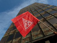 A general view of the IGM labor flag is seen in front of the Thyssenkrupp headquarters as a thousand steel workers stand in front of the gat...