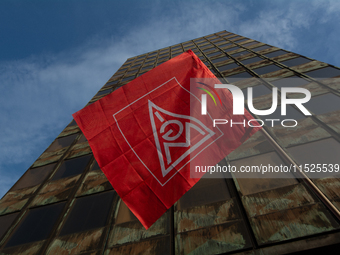 A general view of the IGM labor flag is seen in front of the Thyssenkrupp headquarters as a thousand steel workers stand in front of the gat...