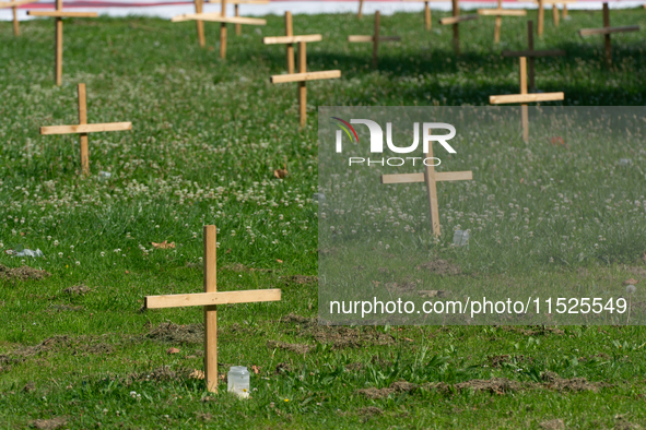 Crosses are placed in front of the headquarters of Thyssenkrupp industrial area in Duisburg, Germany, on August 29, 2024, as the IG Metall u...