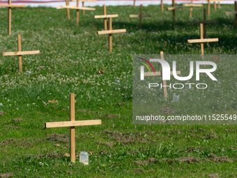 Crosses are placed in front of the headquarters of Thyssenkrupp industrial area in Duisburg, Germany, on August 29, 2024, as the IG Metall u...