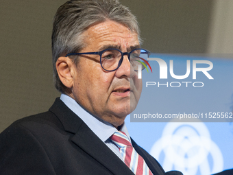 Sigmar Gabriel, the head of the supervisory board, speaks to the media about his resignation during a press conference as a thousand steel w...