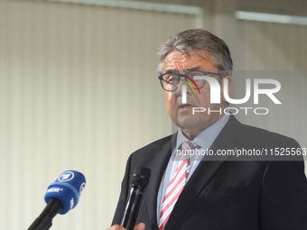 Sigmar Gabriel, the head of the supervisory board, speaks to the media about his resignation during a press conference as a thousand steel w...