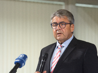 Sigmar Gabriel, the head of the supervisory board, speaks to the media about his resignation during a press conference as a thousand steel w...