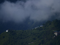 A cloudy view of Bosan Hill is seen from Kirtipur before incessant rainfall in Kathmandu, Nepal, on August 29, 2024. (