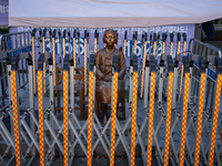 The Comfort Woman statue in front of the Yonhap News Agency building in Susong-dong, Seoul, is surrounded by barricades to prevent attacks f...