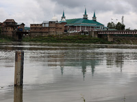 A measuring scale to check the water level is installed in the river Jhelum in Sopore, Jammu and Kashmir, India, on August 30, 2024. (