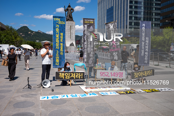 Citizen groups hold a press conference at Gwanghwamun Square in Seoul, South Korea, on August 30, 2024. Thirteen years after the humidifier...