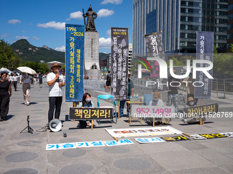 Citizen groups hold a press conference at Gwanghwamun Square in Seoul, South Korea, on August 30, 2024. Thirteen years after the humidifier...