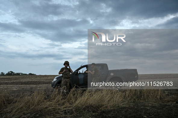 Soldiers of the 118th Separate Mechanized Brigade are seen before the start of the night firing exercise in the Zaporizhzhia sector, Zaporiz...