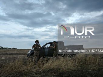 Soldiers of the 118th Separate Mechanized Brigade are seen before the start of the night firing exercise in the Zaporizhzhia sector, Zaporiz...