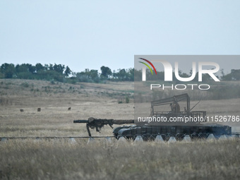 Tankers of the 118th Separate Mechanized Brigade drive a T-72 tank during the live-fire exercise in the Zaporizhzhia sector, Zaporizhzhia re...