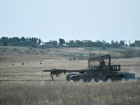 Tankers of the 118th Separate Mechanized Brigade drive a T-72 tank during the live-fire exercise in the Zaporizhzhia sector, Zaporizhzhia re...