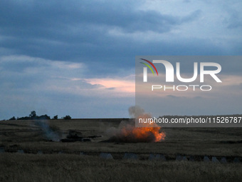 Tankers of the 118th Separate Mechanized Brigade are seen during the night firing exercise in the Zaporizhzhia sector in the Zaporizhzhia re...