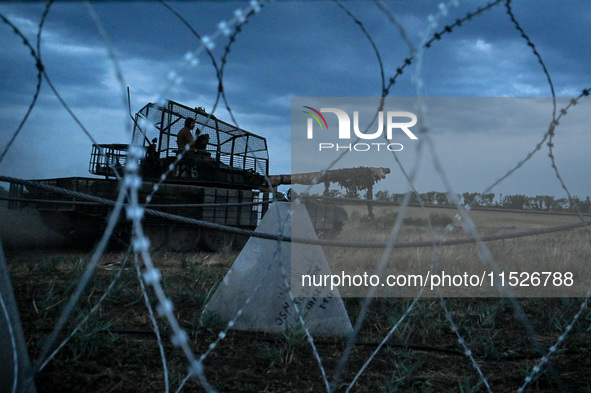 Tankers of the 118th Separate Mechanized Brigade are seen during the night firing exercise in the Zaporizhzhia sector in the Zaporizhzhia re...