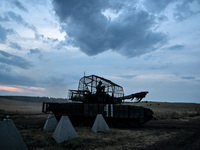 Tankers of the 118th Separate Mechanized Brigade are seen during the night firing exercise in the Zaporizhzhia sector in the Zaporizhzhia re...