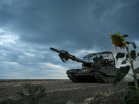 Tankers of the 118th Separate Mechanized Brigade drive a T-72 tank during the live-fire exercise in the Zaporizhzhia sector, Zaporizhzhia re...